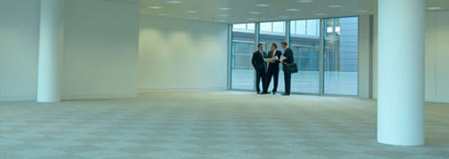Business people talking in a large room